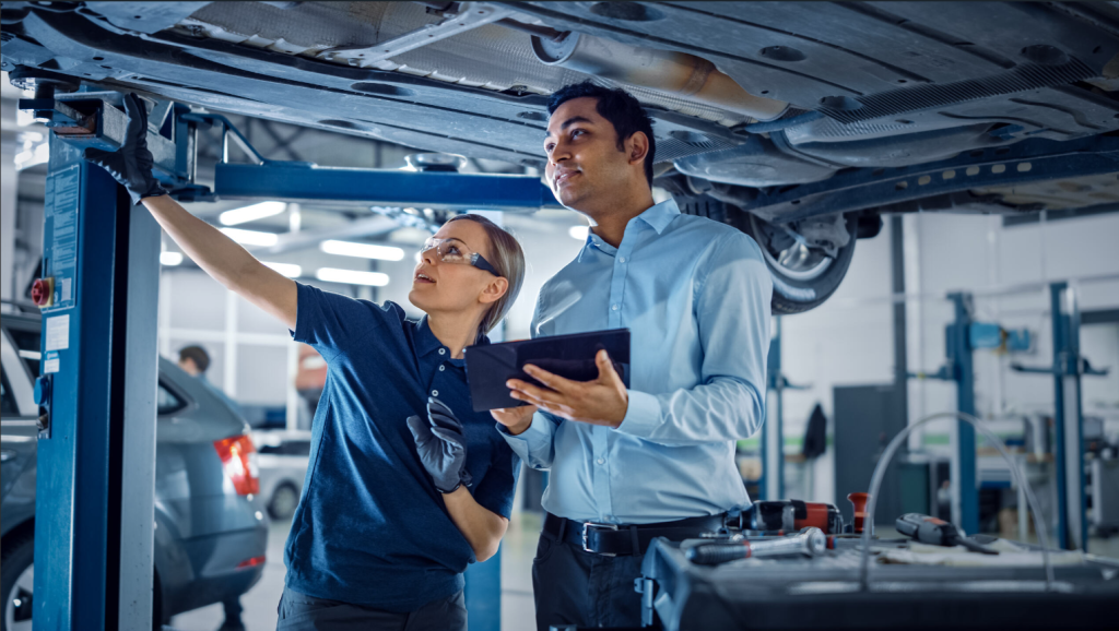 Auto maintenance being done on the underside of a vehicle at Coeur d'Alene Honda.