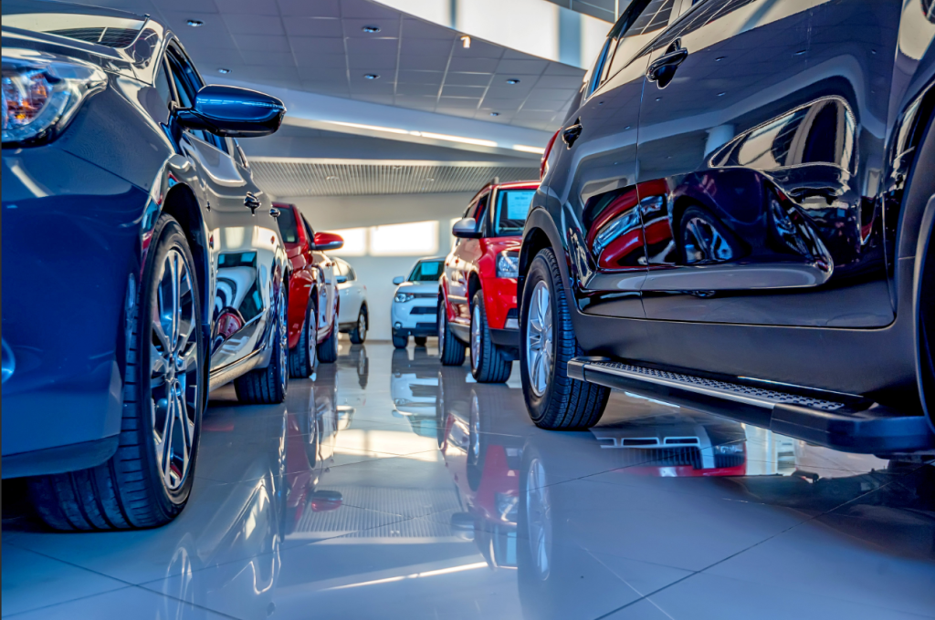 A photo of the inside of a car dealership.
