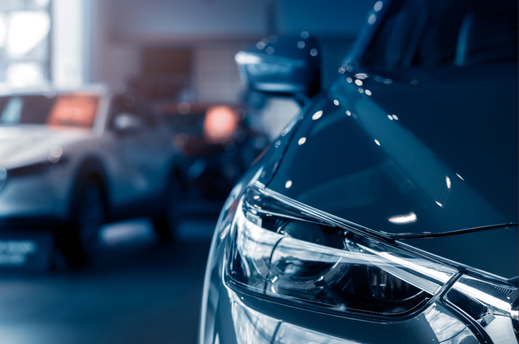 A photo of the inside of a car dealership.