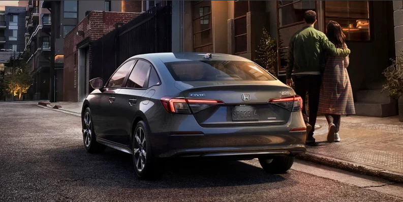 A photo of a 2025 Honda Civic parked on the side of the road.