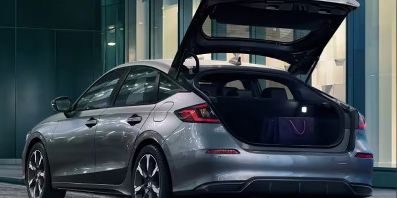 A photo of a 2026 Honda Civic Hatchback with the hatch open.
