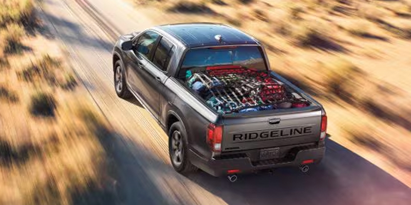 2026 Grey cruising Honda Ridgeline TrailSport
